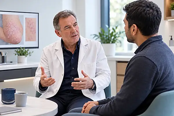 Specialist consultation discussing psoriasis and long-term skin care